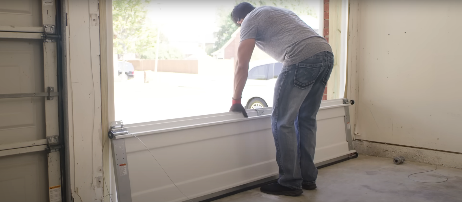 Expert technician of Local Garage Door Repair Company doing garage door installation service in Columbus, Ohio.