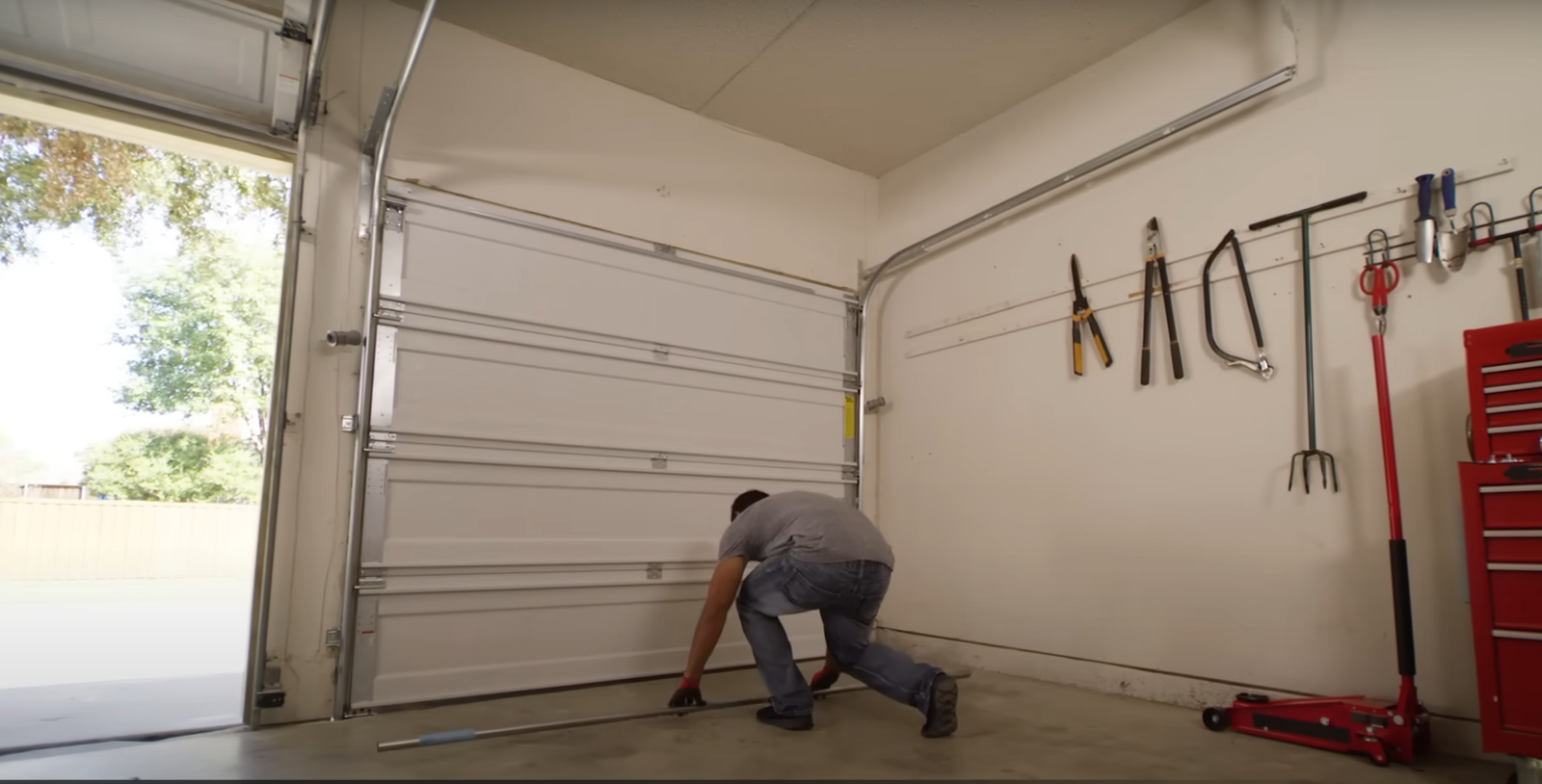 Professional technician providing expert garage door repair services with high-quality tools at Local Garage Door Repair Company