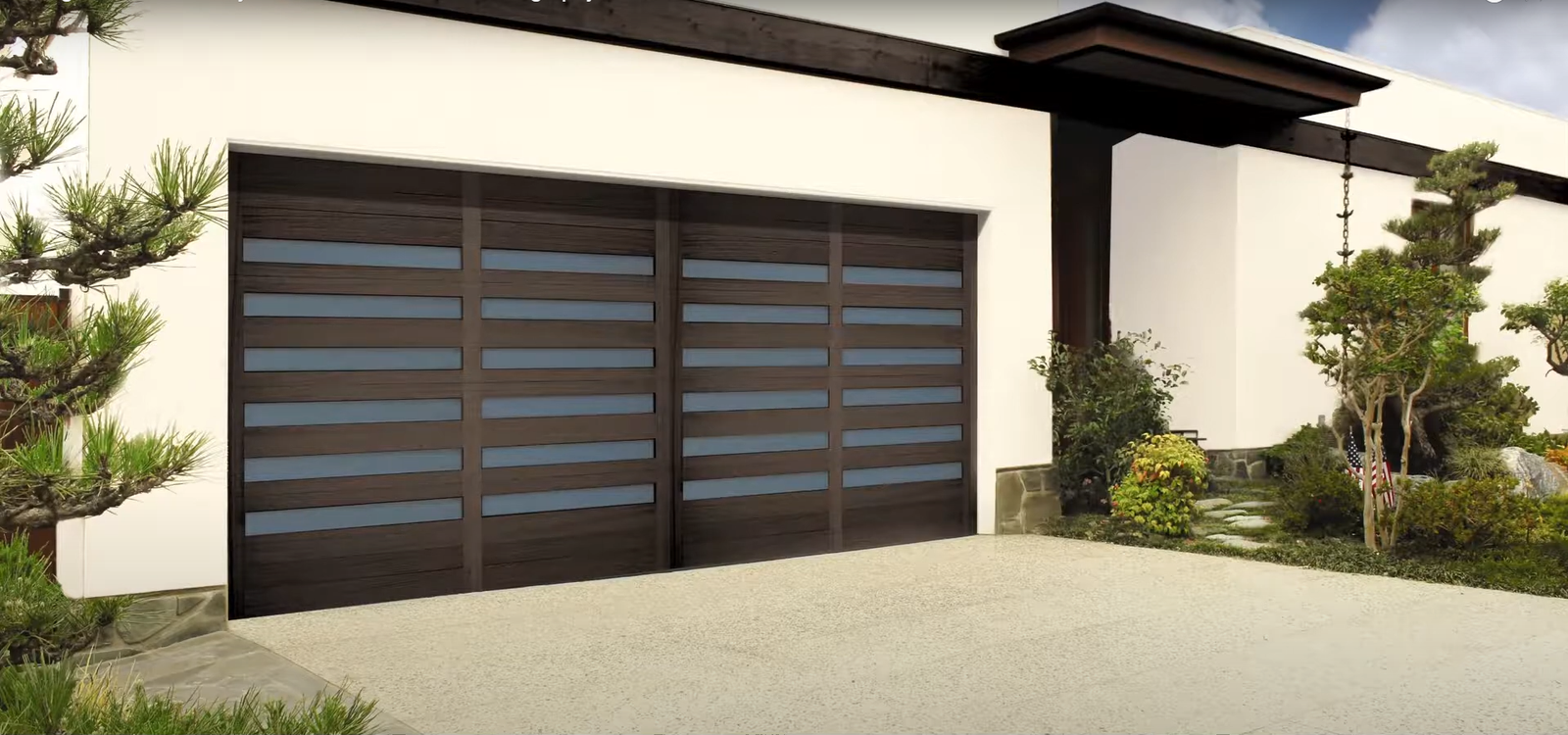 An experienced technician from Local Garage Door Repair Company performing a garage door repair service, showcasing tools and equipment used for fixing common garage door issues.