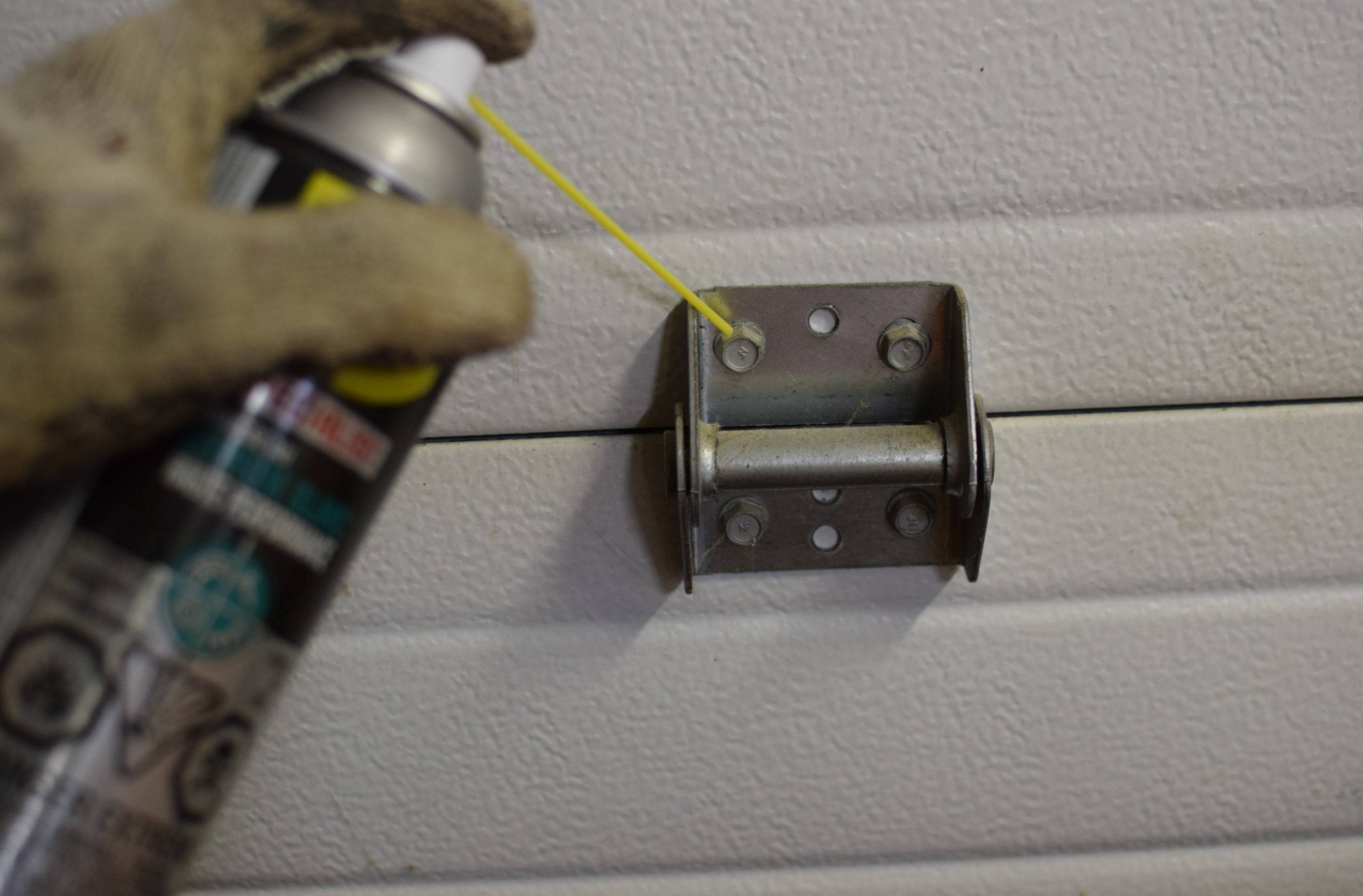 Lubricate bolt to fix noisy garage door.