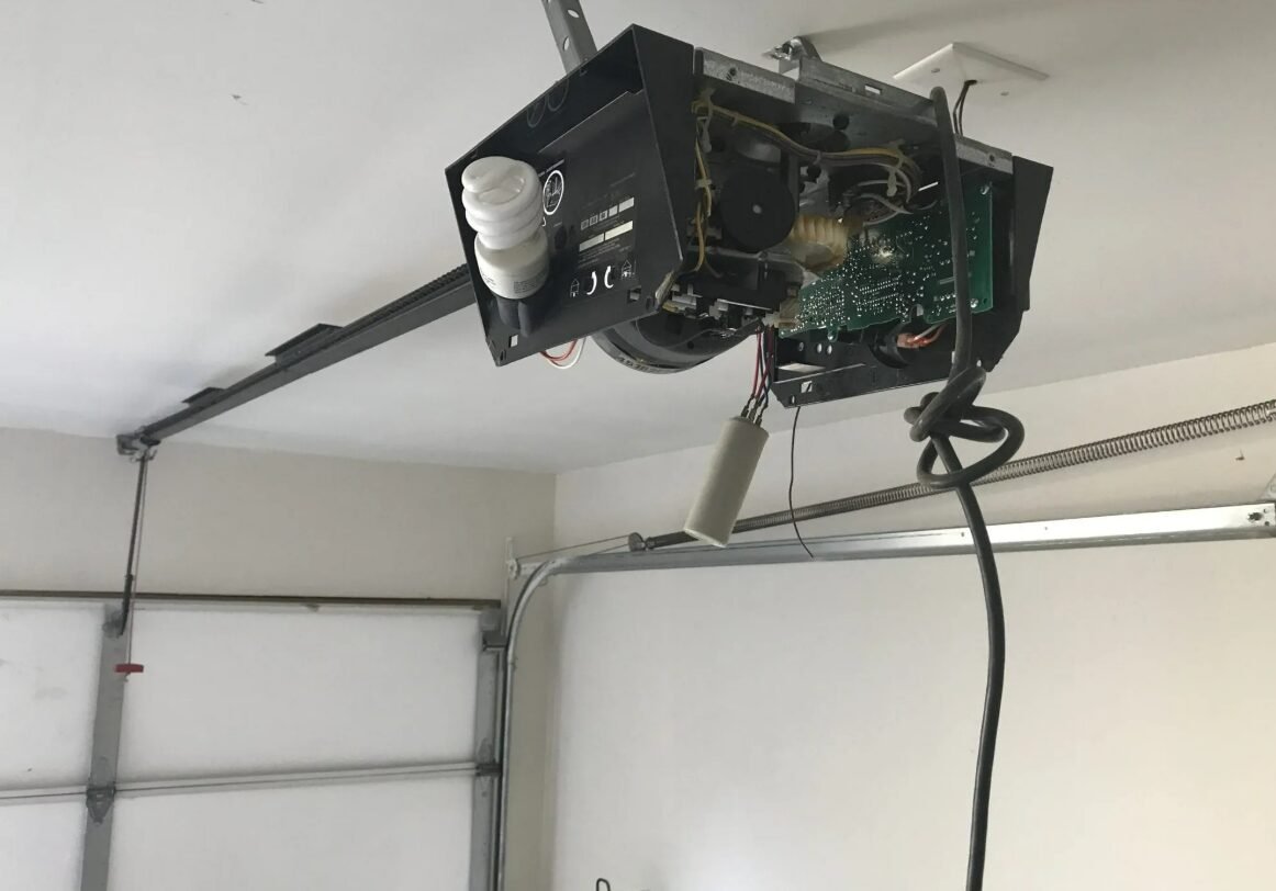 Technician performing garage opener door repair for a residential property, ensuring seamless operation and safety, provided by Local Garage Door Repair Company.